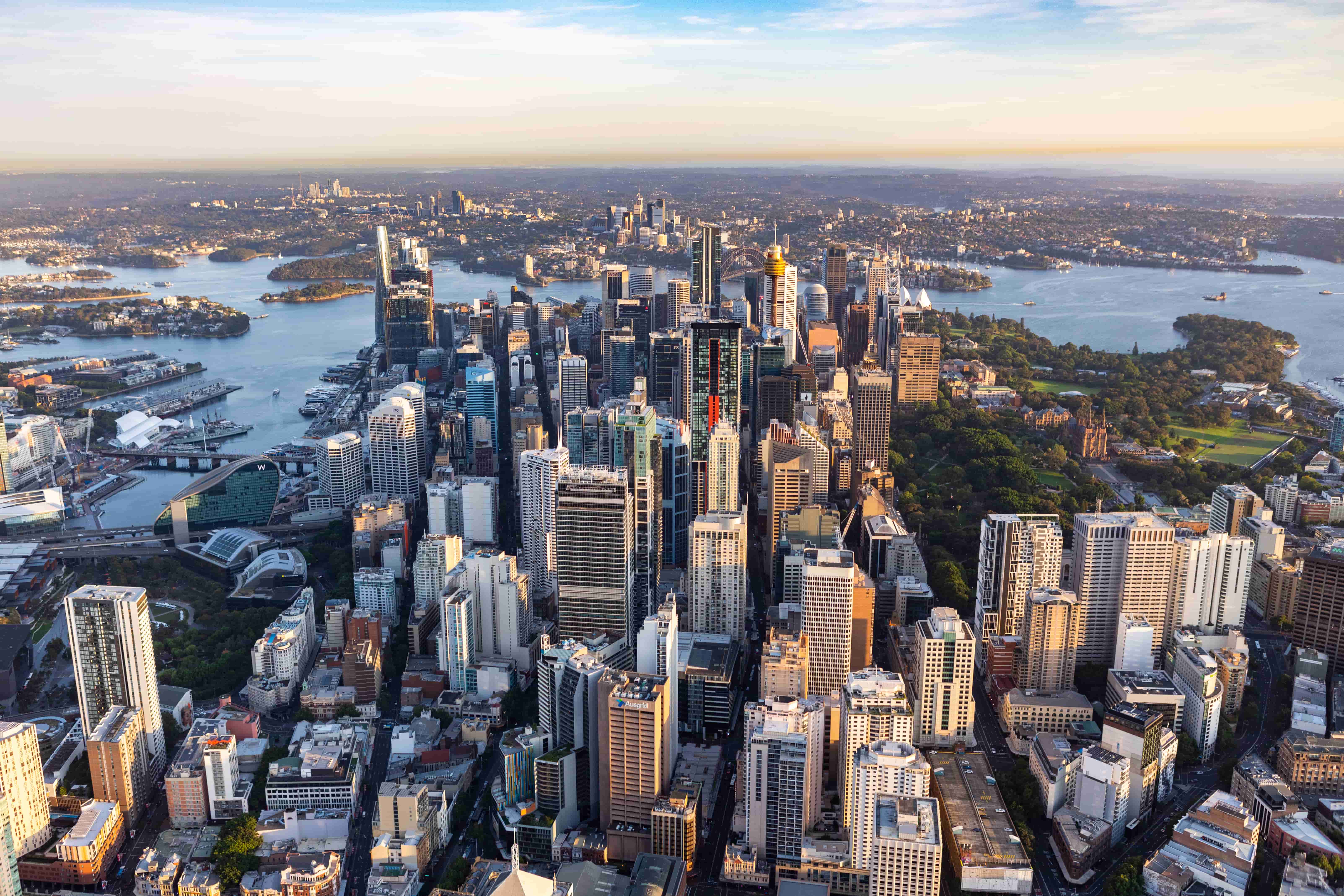 Aerial view of Sydney CBD at golden hour with Sydney Harbour Bridge visible